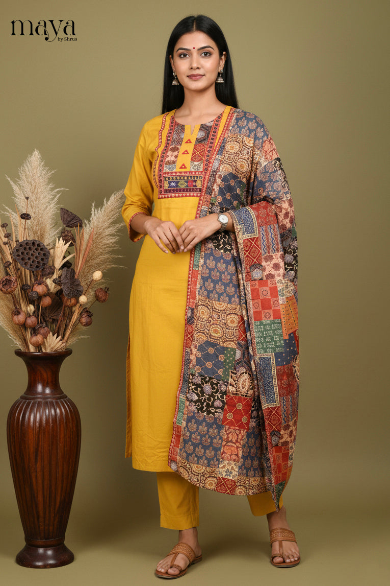 Elegant Yellow Cotton Salwar Set with Printed Yoke Neck & Patchwork Duppatta