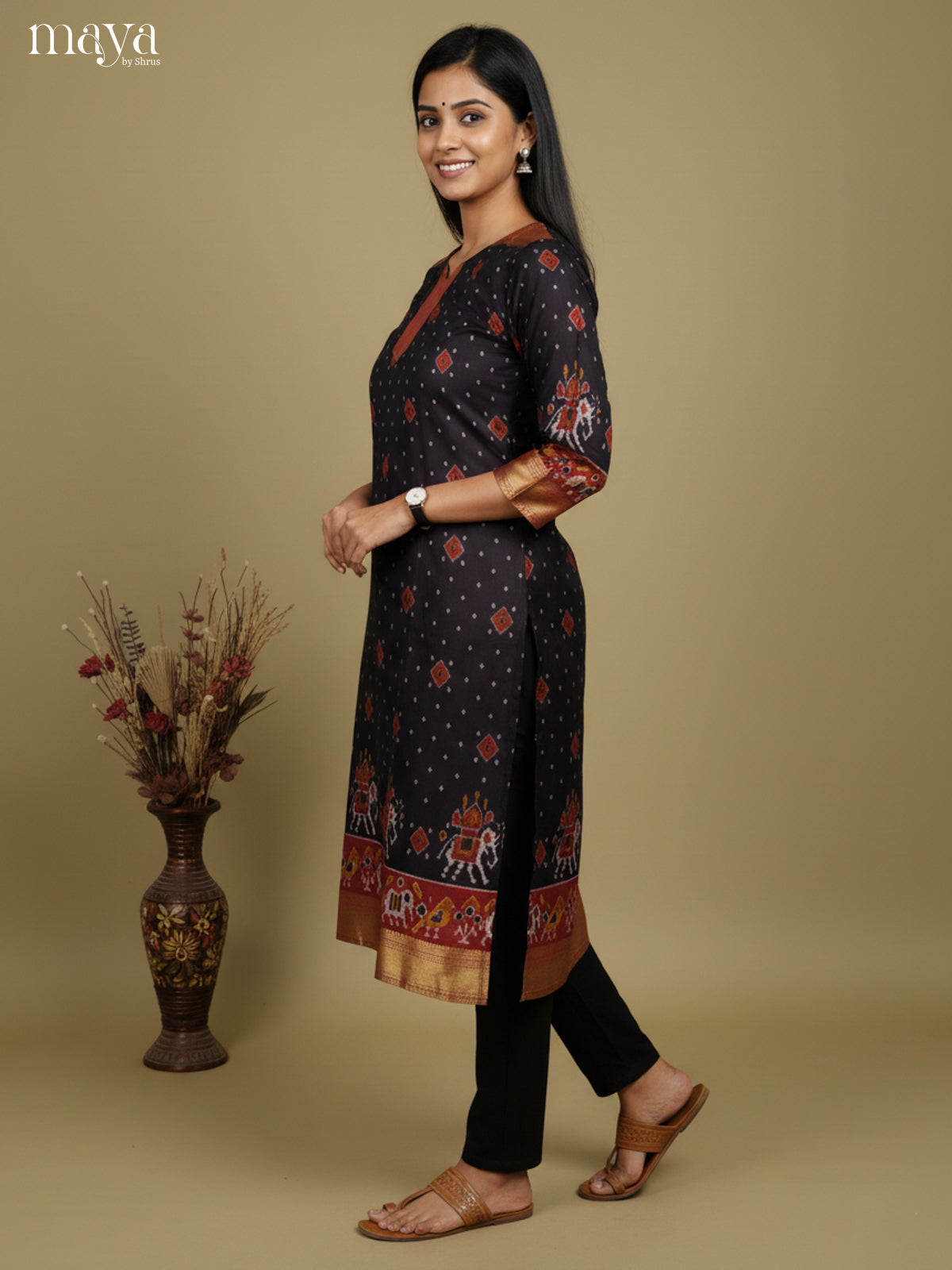 Stunning Black Patola Print Kurti with Silk Zari Border