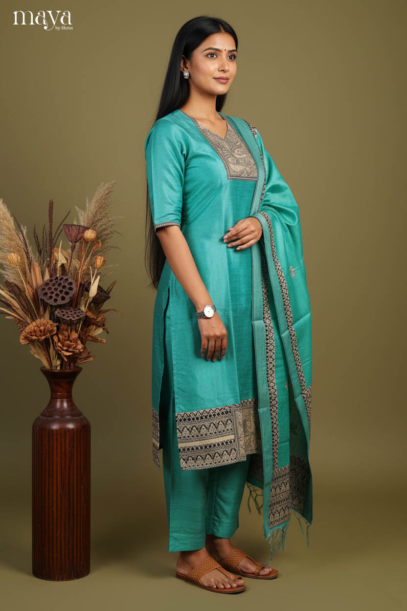 Stunning Teal Salwar Suit With V Neck & Kalamkari Printed Yoke Neck