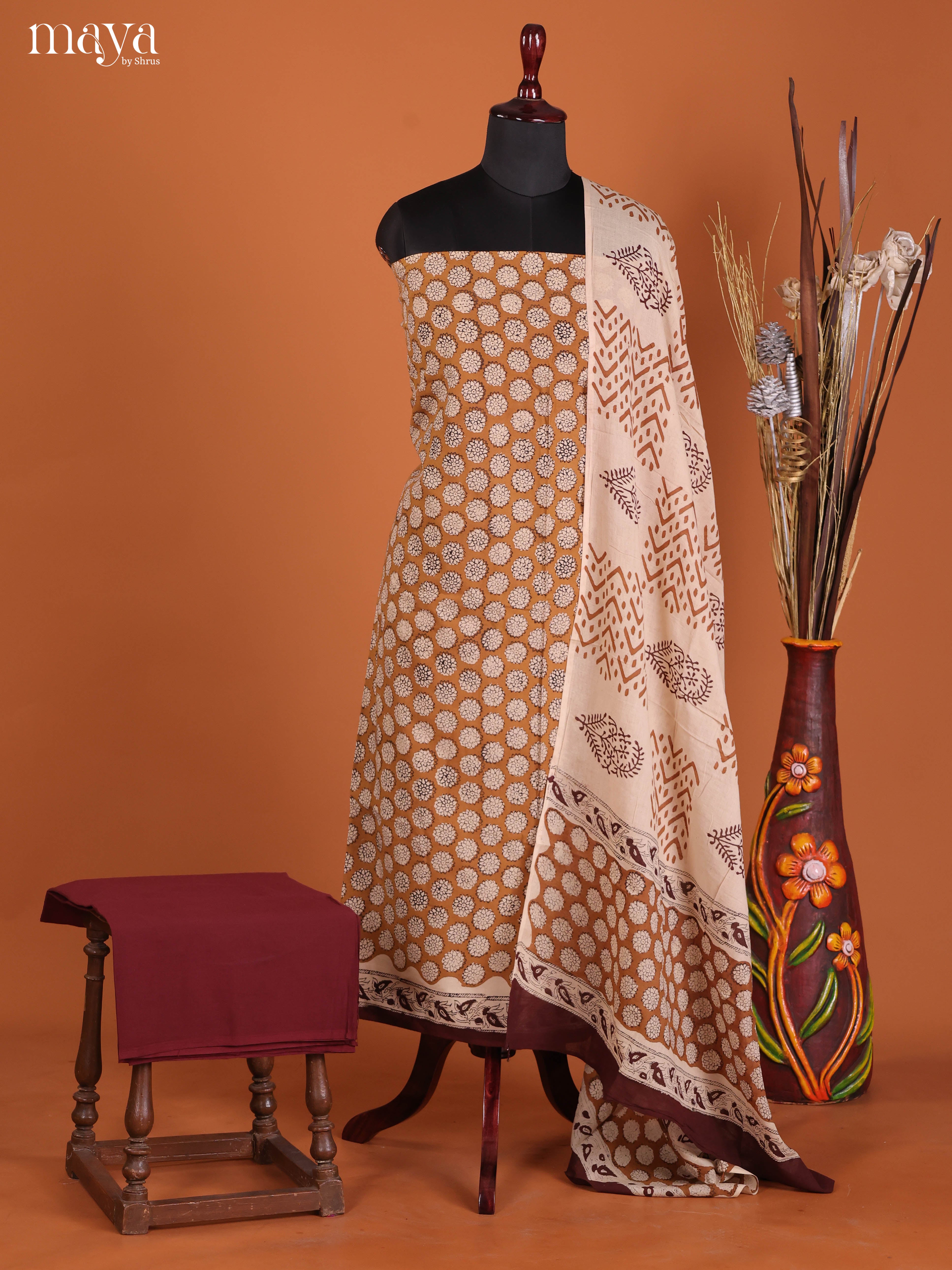 Graceful Mustard Cotton Unstitched Salwar Set With Beautiful Prints