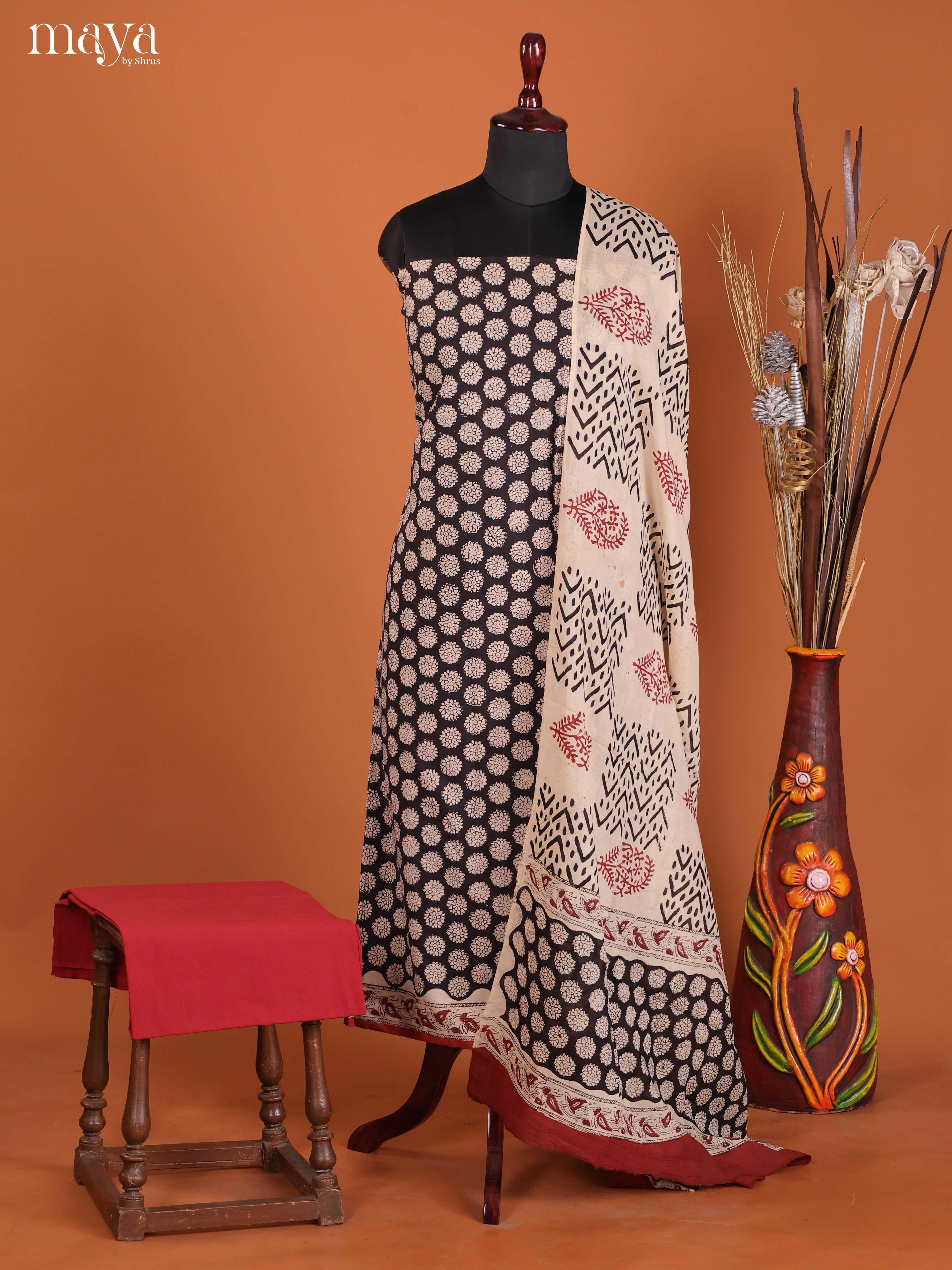 Pretty Black Cotton Unstitched Salwar Set With Floral Print