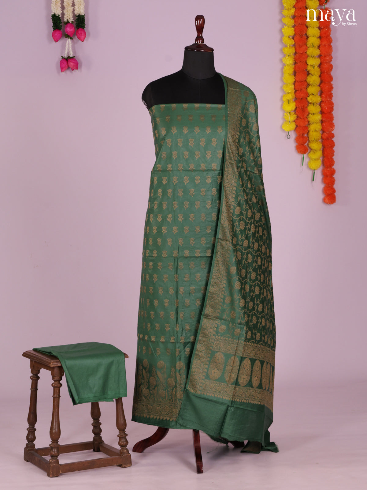 Serene Dark Green Semi Tussar Salwar Suit Material With Zari Buttas