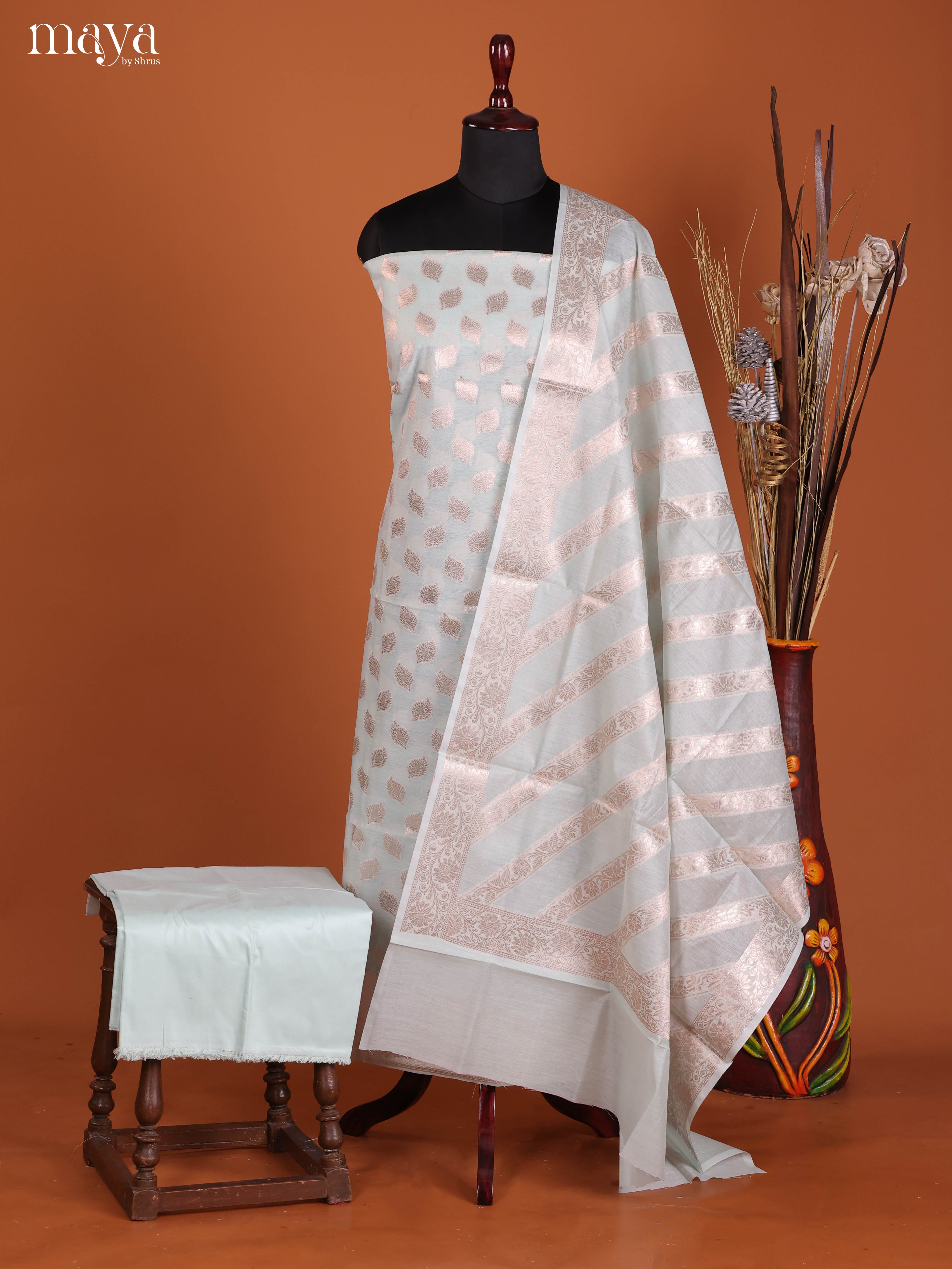 Regal Mint Green Semi Tussar Salwar Suit Material With Zari Buttas