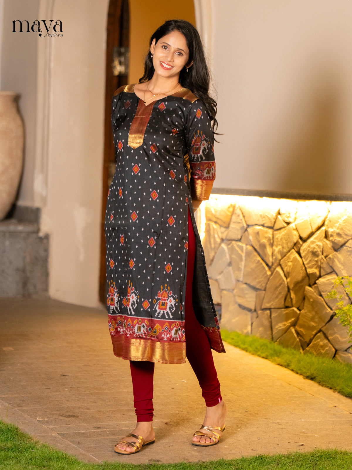 Stunning Black Patola Print Kurti with Silk Zari Border
