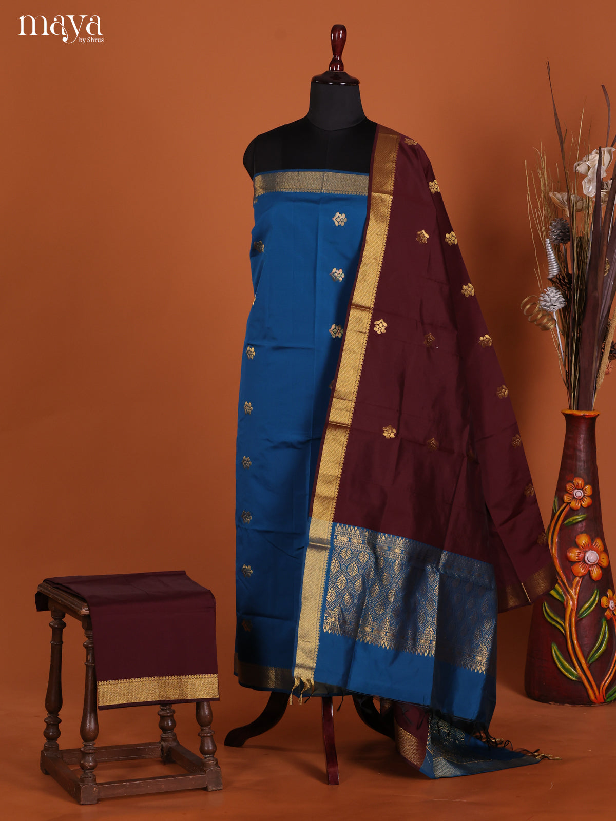 Vibrant Blue Semi Soft Silk Salwar Suit With Maroon Dupatta & Zari Buttas