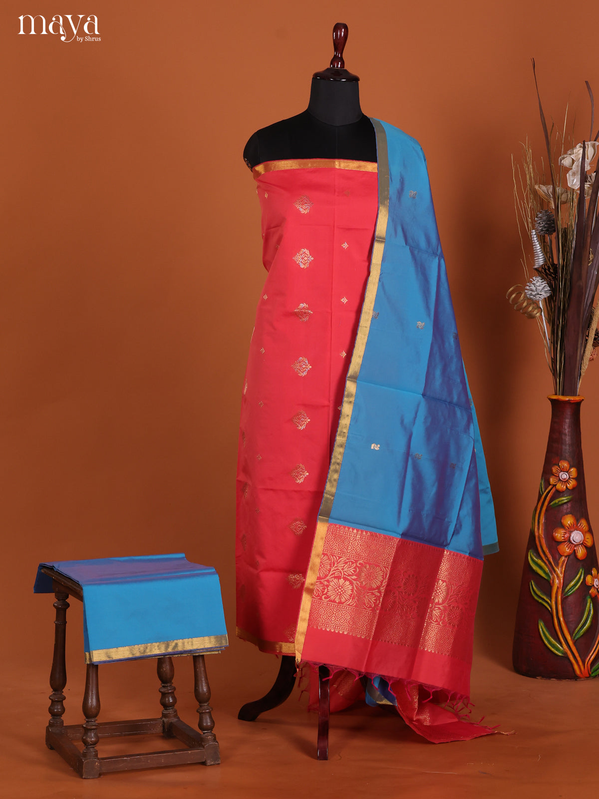 Radiant Reddish Pink Semi Soft Silk Salwar Suit With Blue Dupatta