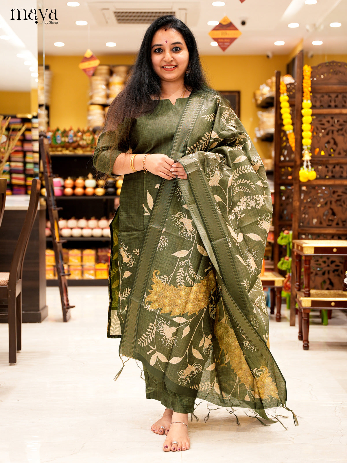 Elegant Green Salwar Suit In Semi Tussar Material With Peacock Motifs