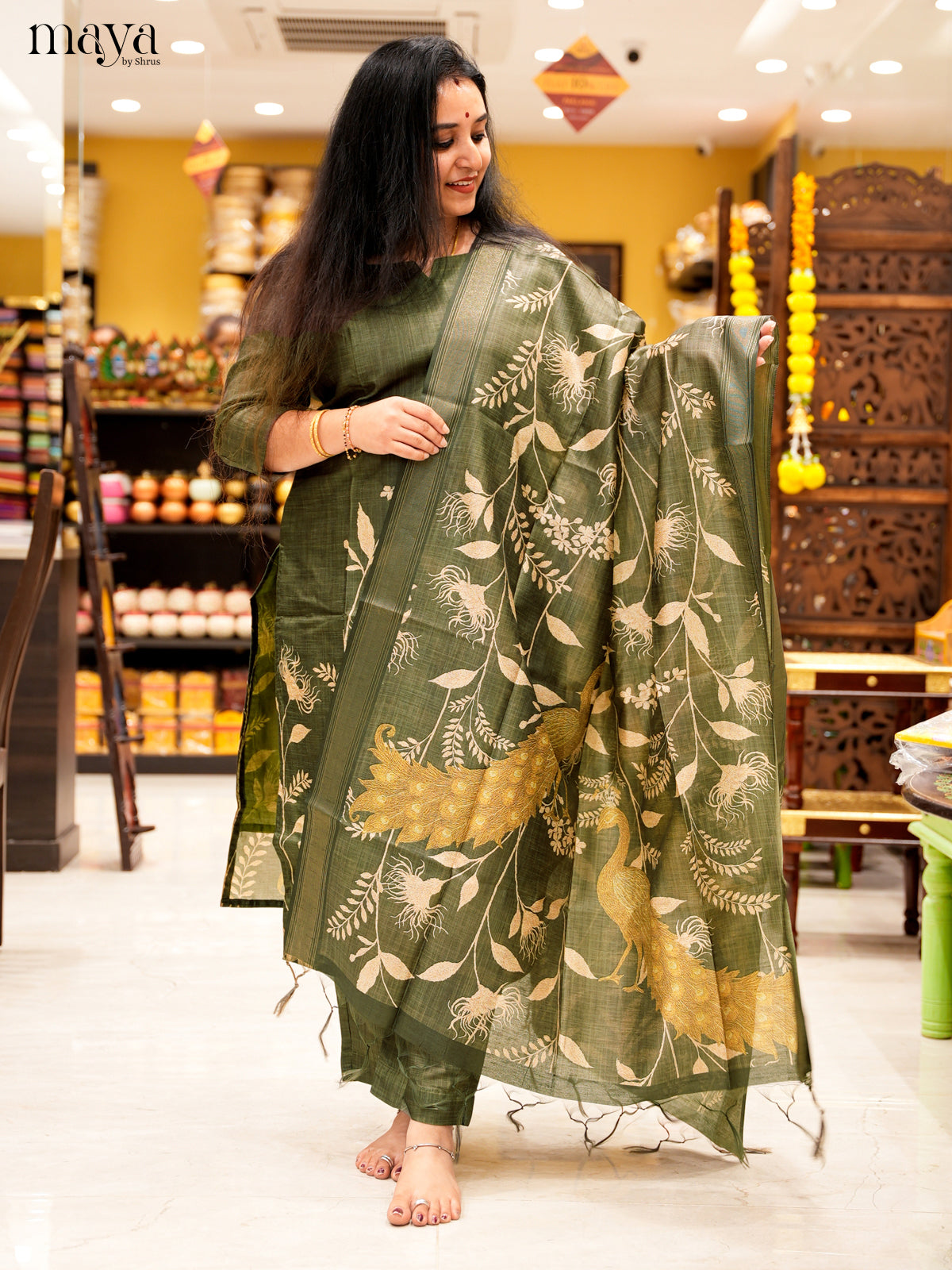 Elegant Green Salwar Suit In Semi Tussar Material With Peacock Motifs
