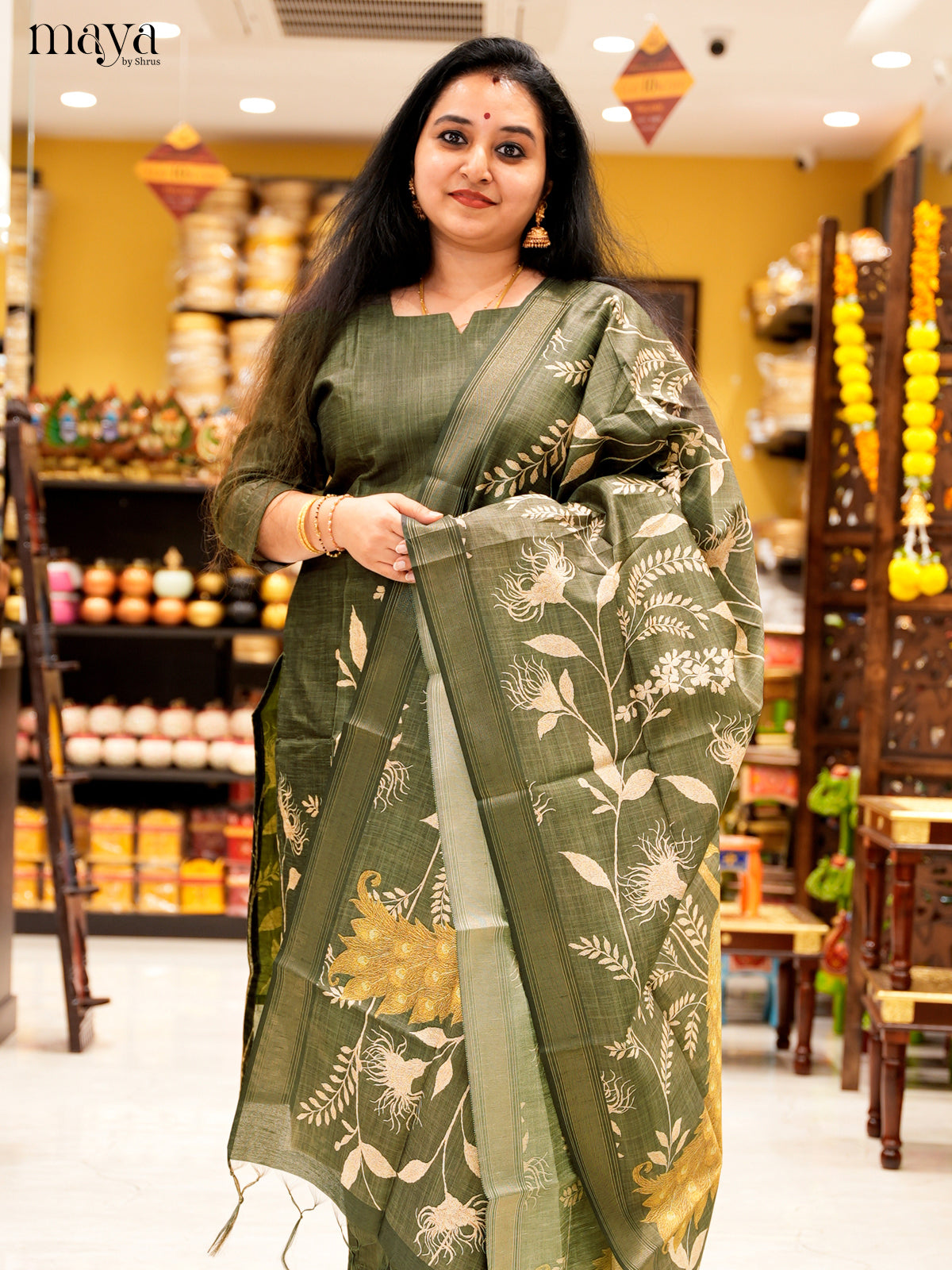 Elegant Green Salwar Suit In Semi Tussar Material With Peacock Motifs