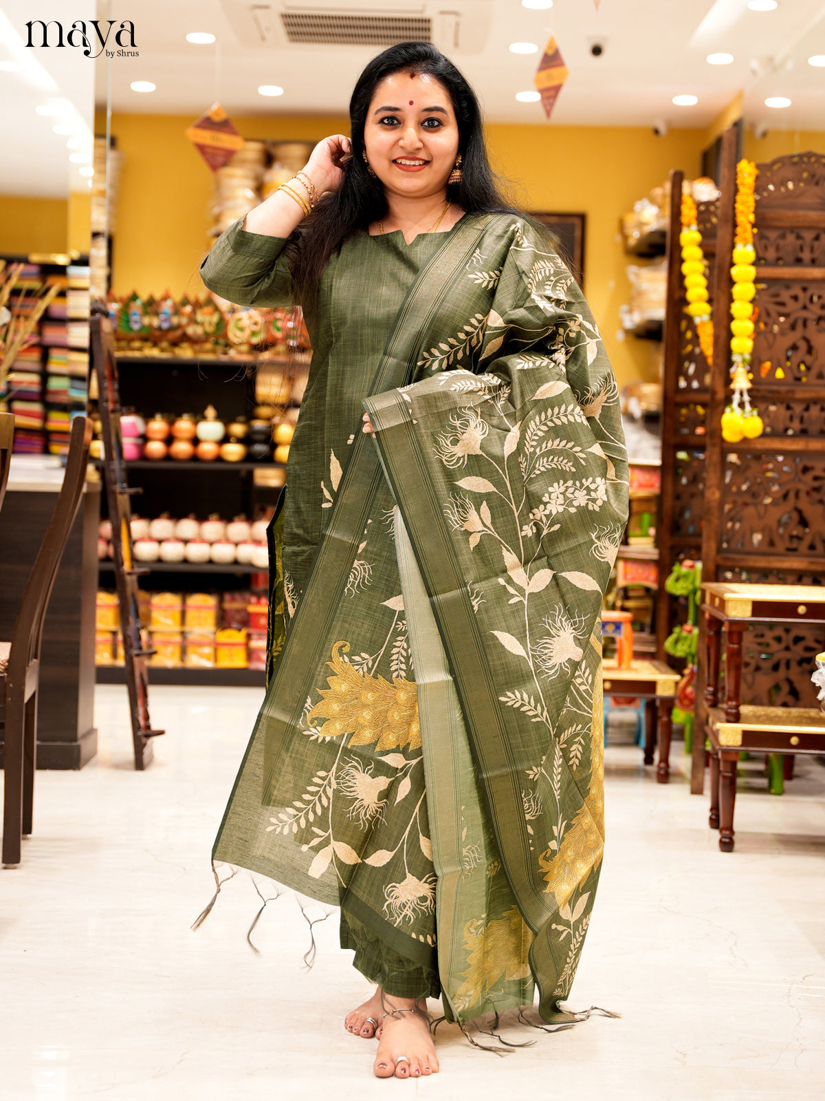 Elegant Green Salwar Suit In Semi Tussar Material With Peacock Motifs