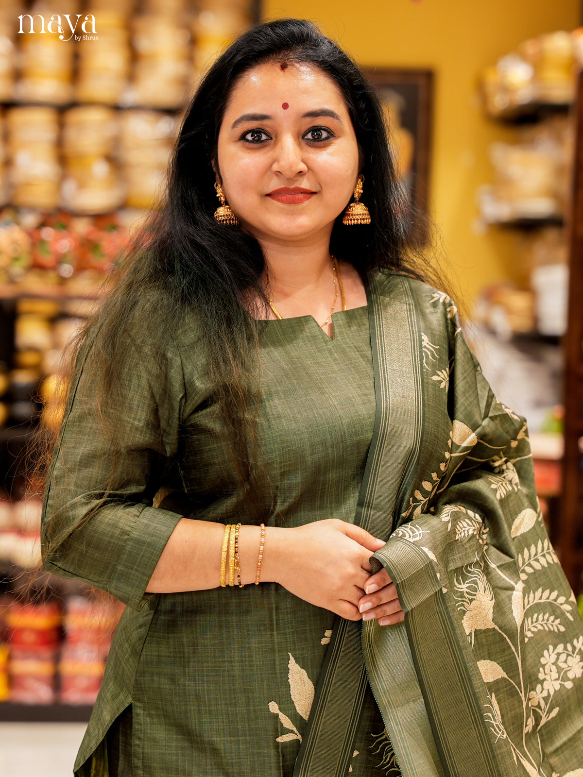 Elegant Green Salwar Suit In Semi Tussar Material With Peacock Motifs