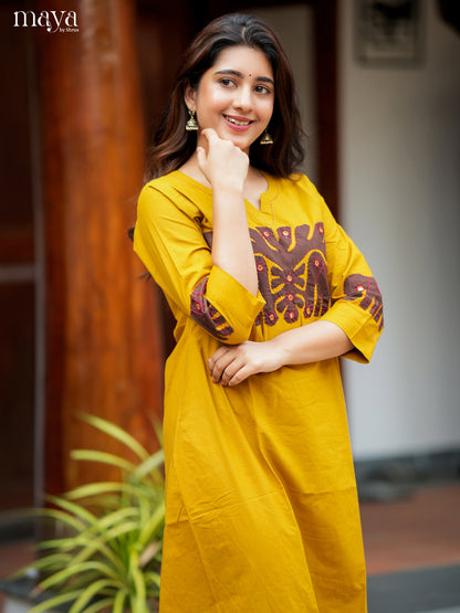 Chic Yellow Readymade Kurti with elephant patch work neck yoke  - MEA29008
