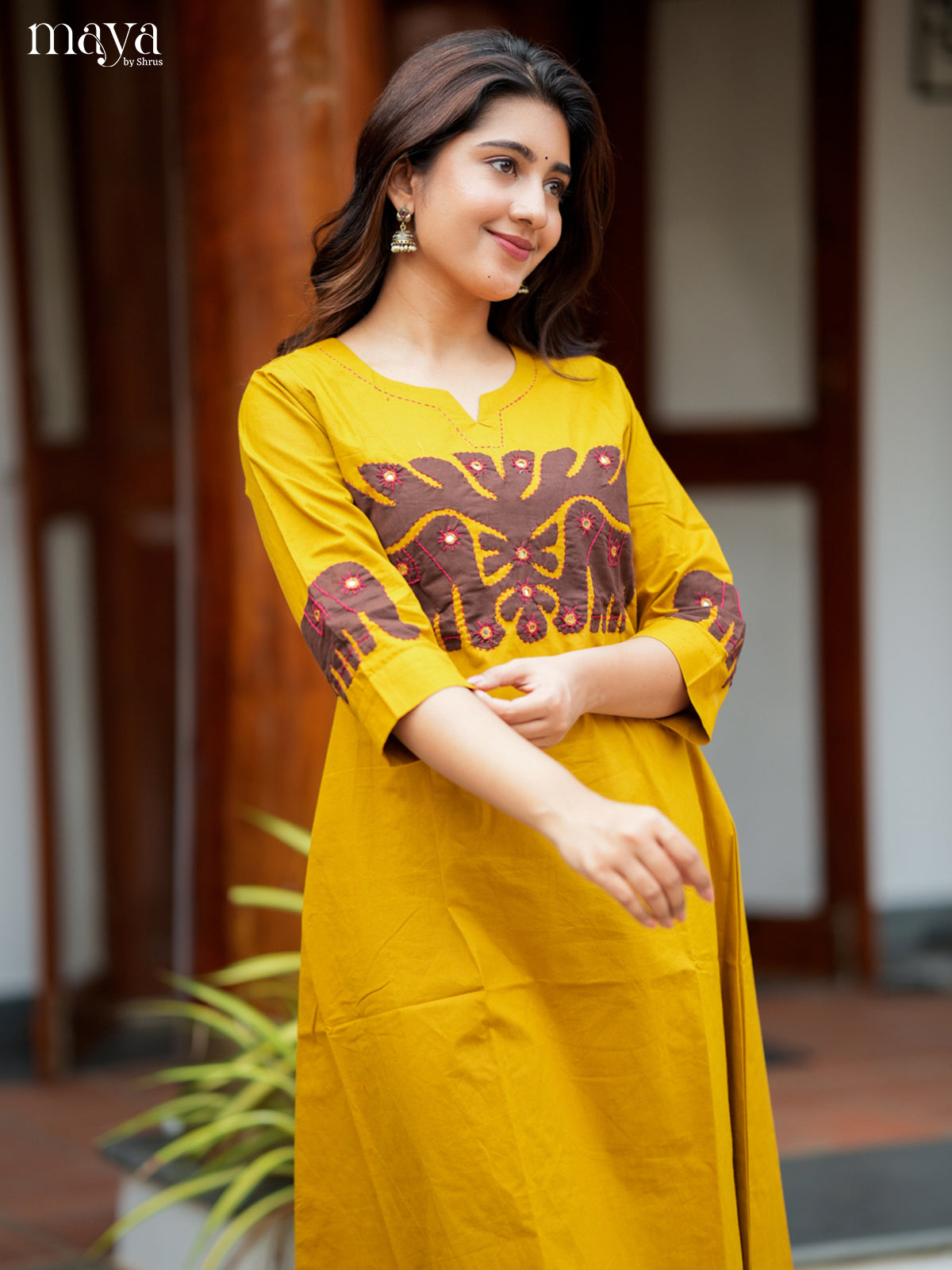 Chic Yellow Readymade Kurti with elephant patch work neck yoke  - MEA29008