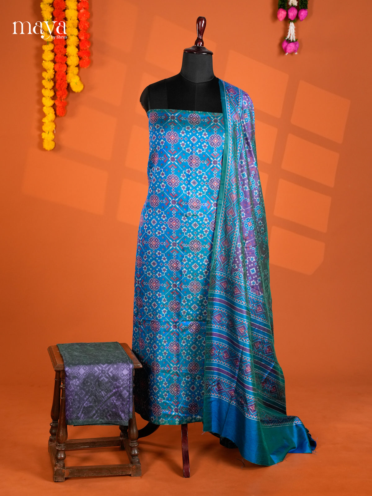 Vibrant Blue & Violet Semi patola salwar unstitch with floral motifs- MEA12012