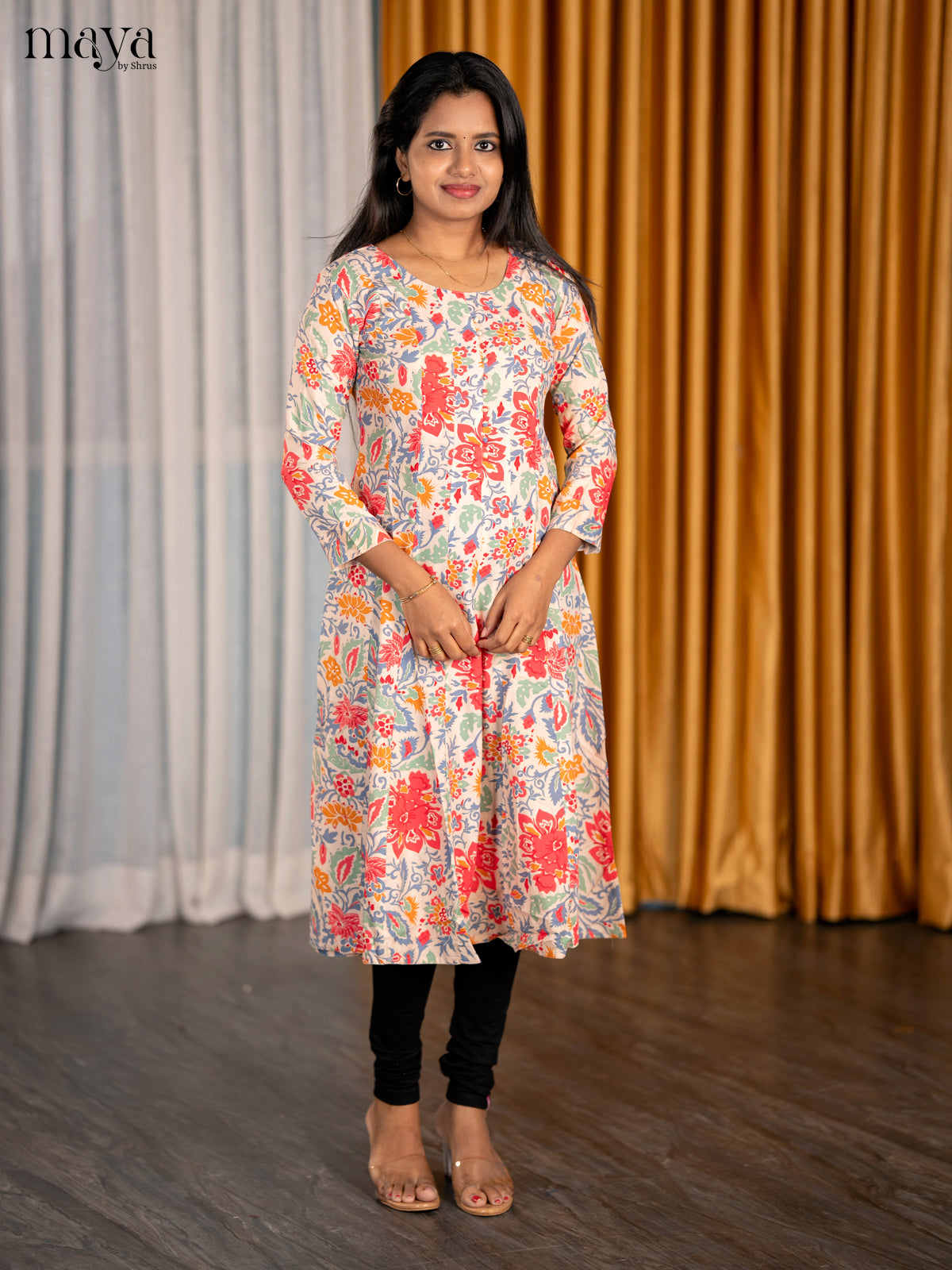 Vibrant Floral Cotton Kurti With Flowy Drape & Round Neck