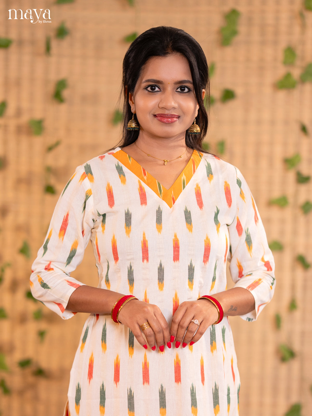 White Readymade Cotton Kurti With Colourful Ikkat Prints