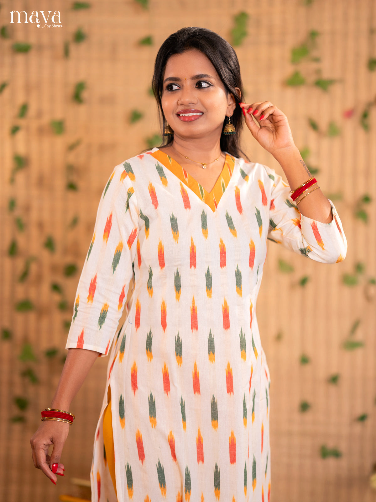 White Readymade Cotton Kurti With Colourful Ikkat Prints