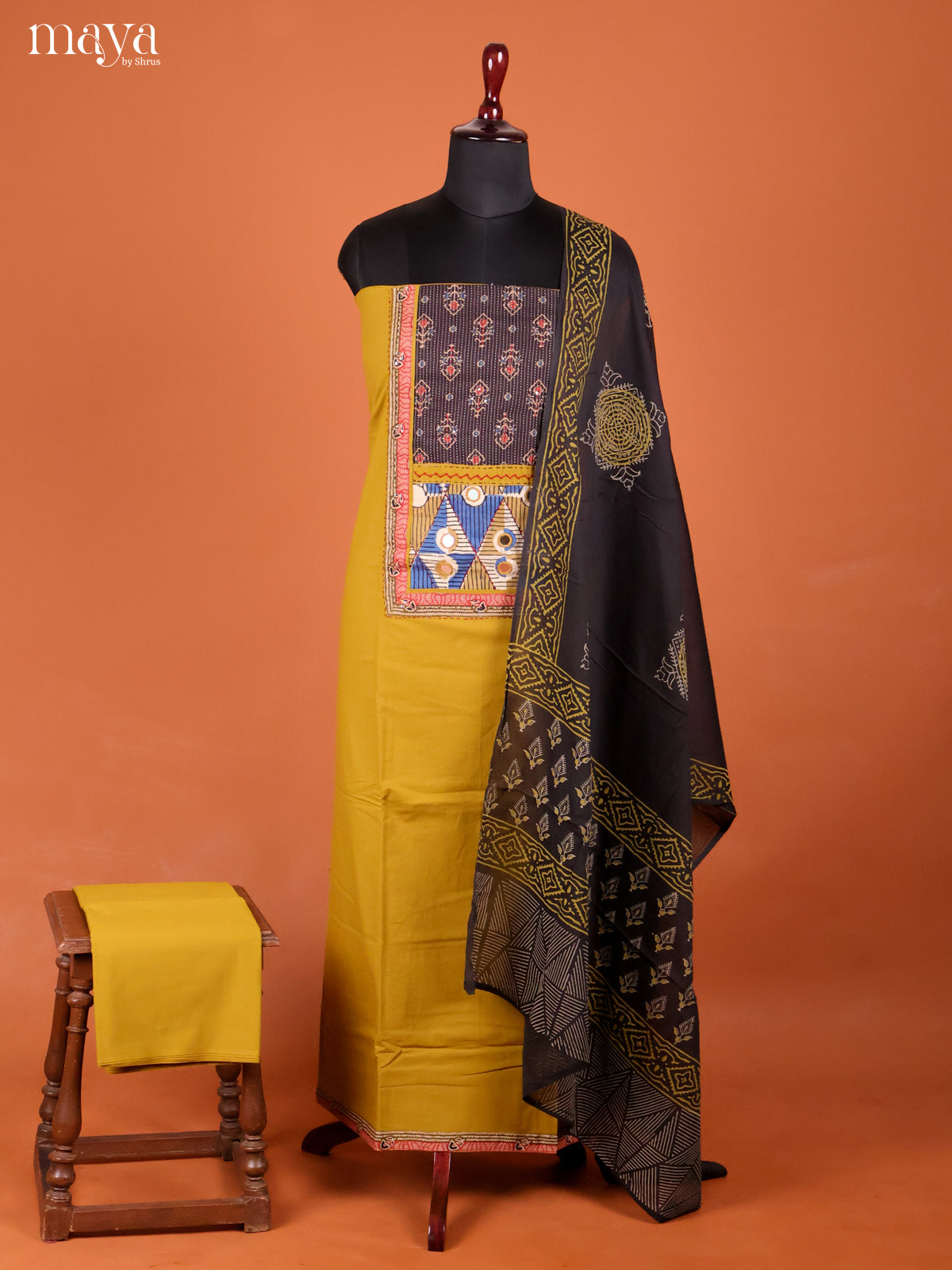 Chic Mustard Ajrakh Cotton Dress Material With Black Dupatta