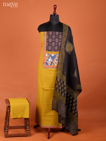 Chic Mustard Ajrakh Cotton Dress Material With Black Dupatta
