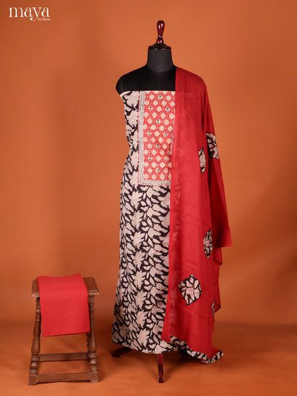 Striking Black Floral Cotton Unstitched Salwar Set With Yoke Neck & Red Dupatta
