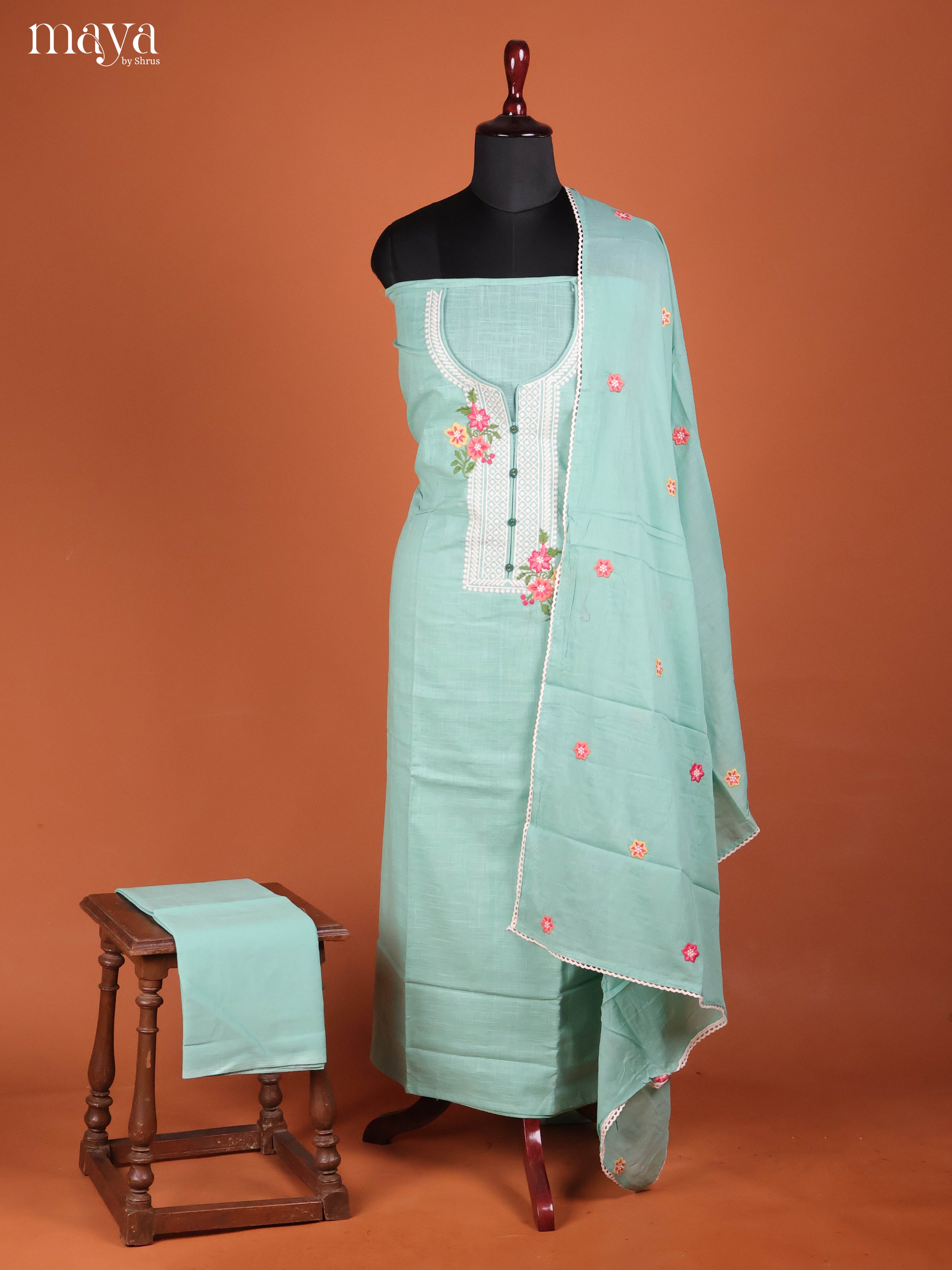 Graceful Pastel Blue Cotton Unstitched Salwar Set With Embroidered Neck