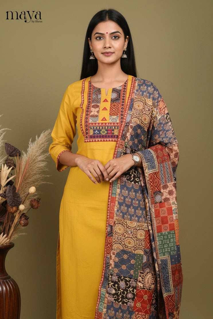 Elegant Yellow Cotton Salwar Set with Printed Yoke Neck & Patchwork Duppatta