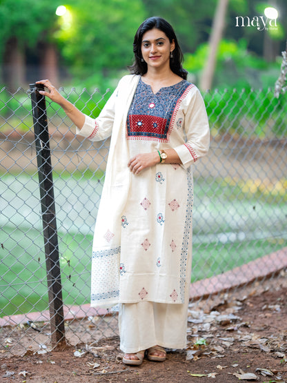 Charming Off white salwar suit With Printed Yoke Neck