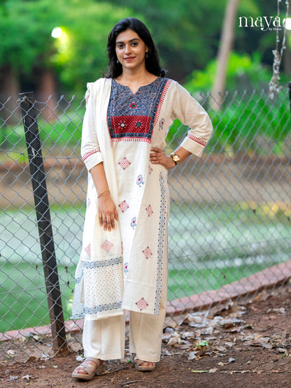Charming Off white salwar suit With Printed Yoke Neck