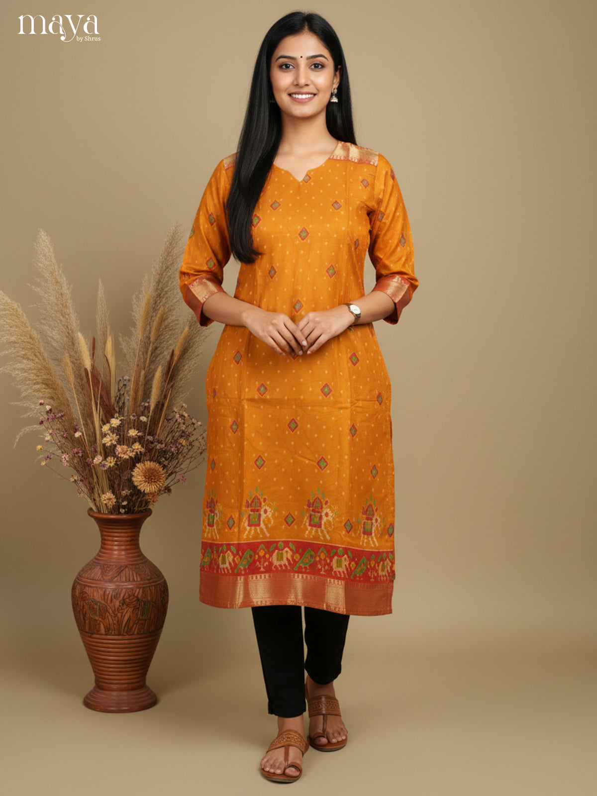 Luxurious Yellow Semi Patola Print Kurti with Silk Zari Border