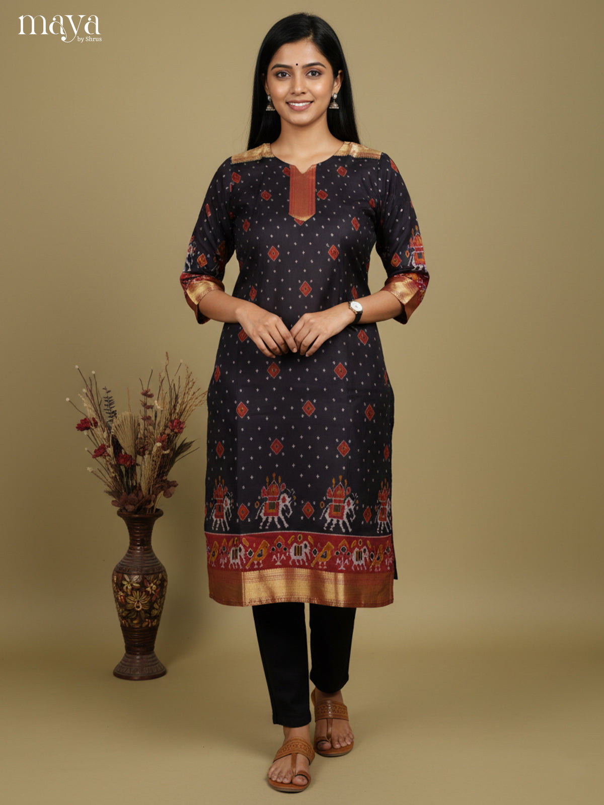 Stunning Black Patola Print Kurti with Silk Zari Border