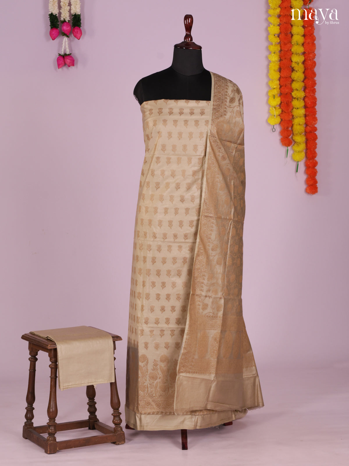 Exquisite Golden Semi Tussar Salwar Suit Material With Zari Buttas