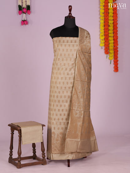 Exquisite Golden Semi Tussar Salwar Suit Material With Zari Buttas