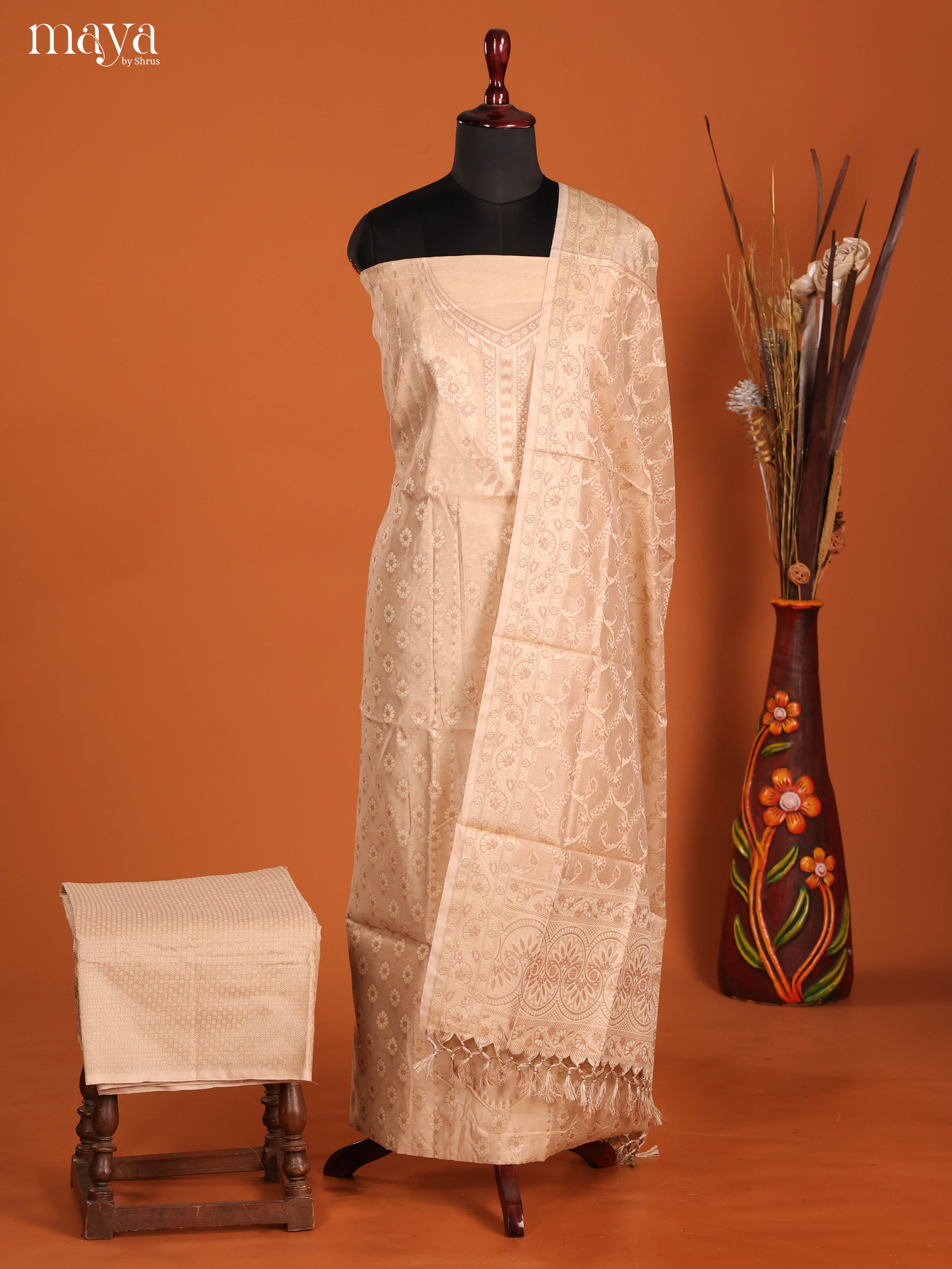 Graceful Cream Self Designed Semi Tussar Salwar Suit Material