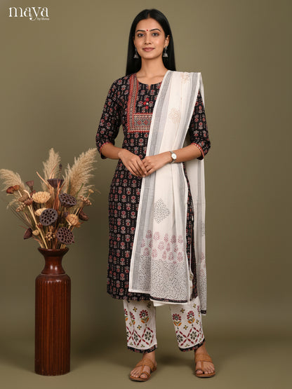 Sophisticated Black Floral Printed Cotton Salwar Suit Set With White Dupatta