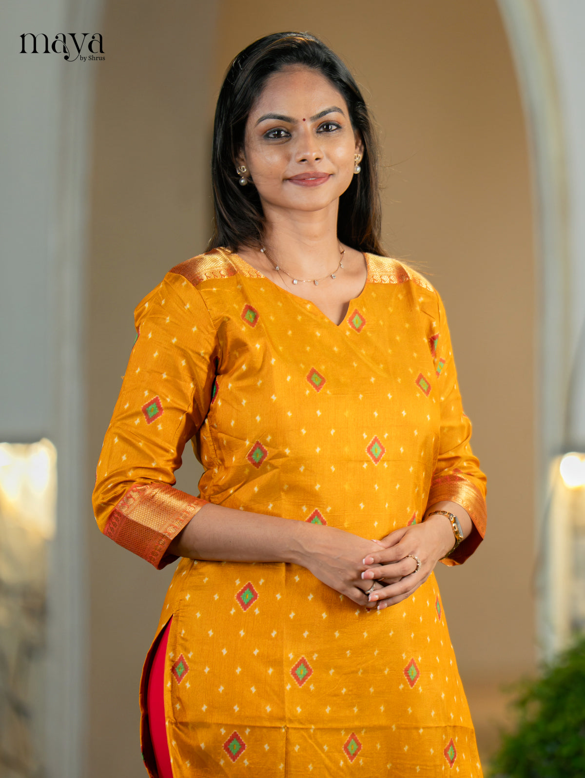 Luxurious Yellow Semi Patola Print Kurti with Silk Zari Border