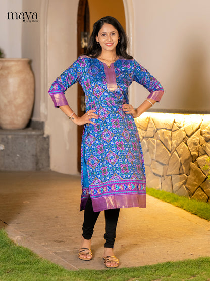 Exquisite Blue Patola Print Kurti with Silk Zari Border