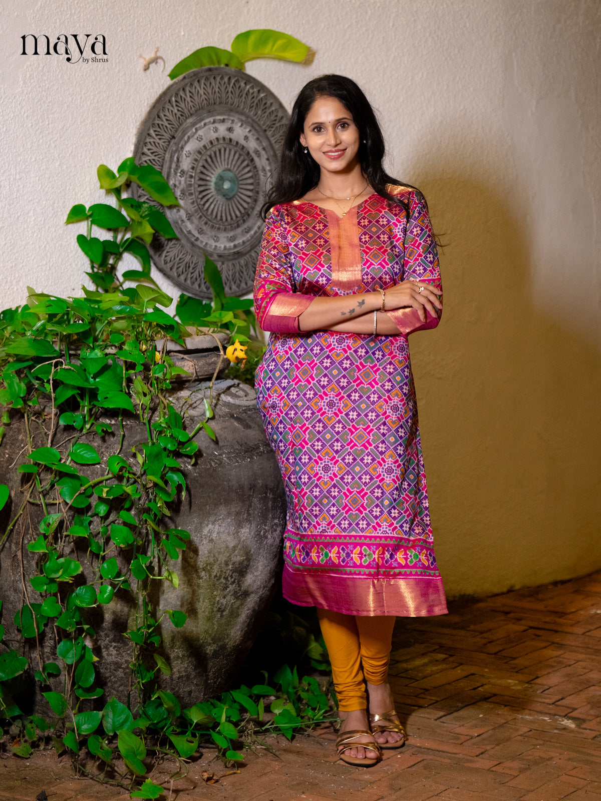 Gorgeous Purple Patola Print Kurti with Silk Zari Border