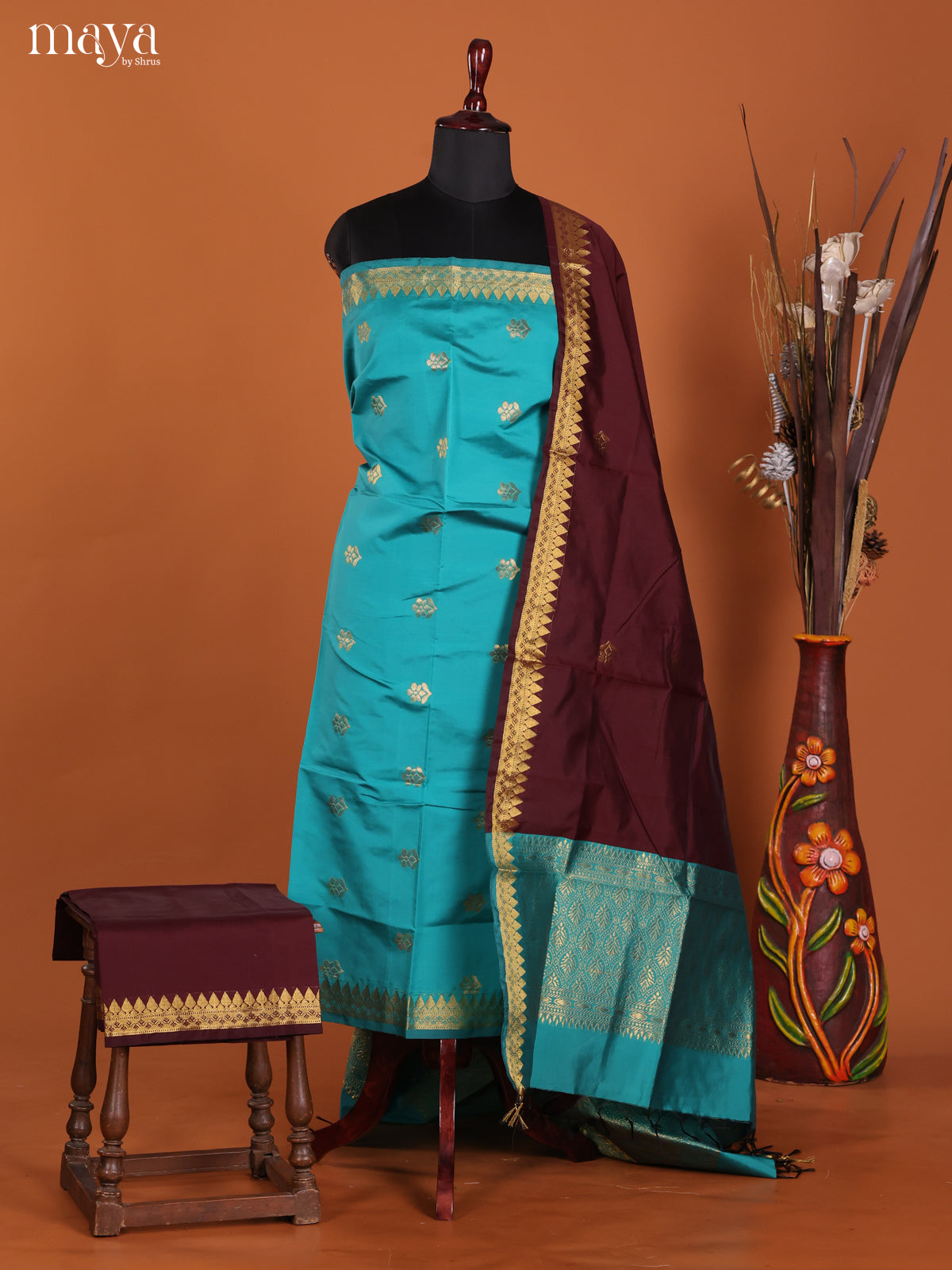 Stunning Turquoise Semi Silk Salwar Suit With Floral Buttis & Brown Dupatta