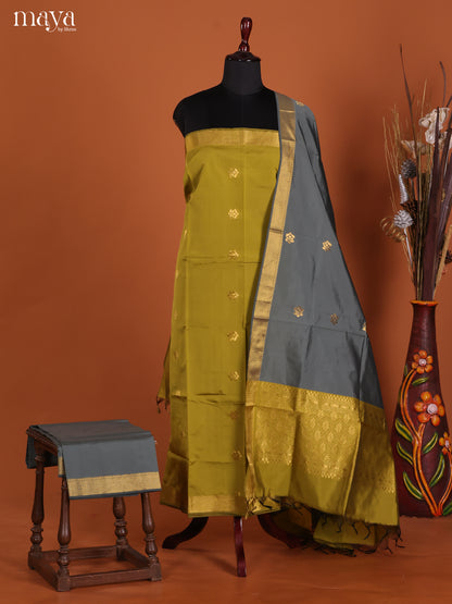 Classic Olive Green Semi Soft Silk Salwar Suit With Grey Dupatta & Zari Border
