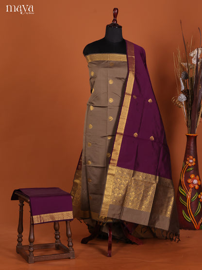Gorgeous Grey Semi Soft Silk Salwar Suit With Purple Dupatta & Zari Border