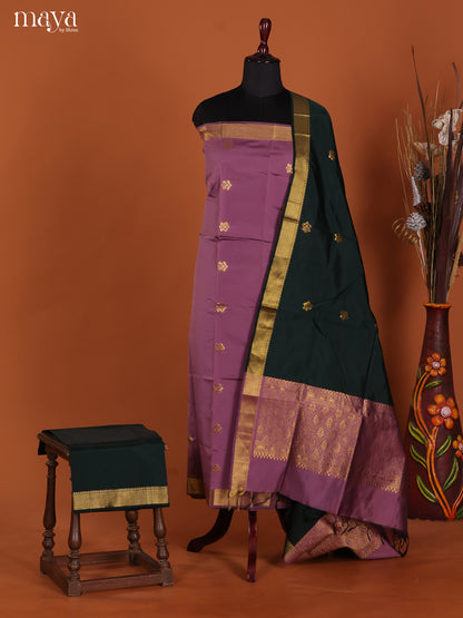Elegant Lilac Semi Soft Silk Salwar Suit With Zari Buttis & Bottle Green Dupatta