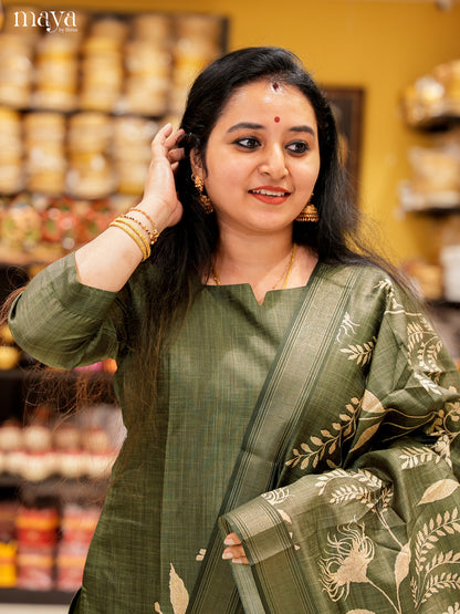 Elegant Green Salwar Suit In Semi Tussar Material With Peacock Motifs