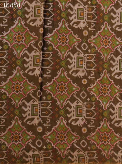 Beautiful Chutney Green & Brick Semi patola salwar unstitch with elephant motifs MEA09036